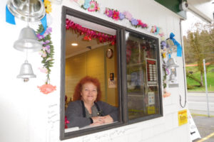 Leslie Rick, owner of Mystic Gardens, a florist in Camas, is an ordained minister who can provide weddings in her business' drive-thru. Weddings can also be held inside the floral shop or on the covered patio. (Photos by Dawn Feldhaus/Post-Record)