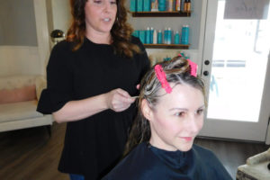 Julie Conger, owner of Salon 904, in downtown Camas, prepares to cut Gayle Singleton's hair on March 23. Conger opened the hair salon in June of 2017. "I love making clients feel happy and comfortable here," she said. "I want them to feel like family and that this is a fun space to hang out." 