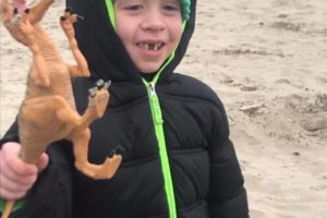 (Contributed photo courtesy of the Reagan family)
Declan Reagan, son of Washougal Police Officer Francis Reagan, played this weekend with a velociraptor dinosaur toy, sent from people who work with “Jurassic World” and “Guardians of the Galaxy” actor Chris Pratt. Declan, 5, spent the weekend in Lincoln City, Oregon, with his twin brother, Adrian, their father, and mother, Lauren Reagan. Pratt recently sent an encouraging video to Declan and his family. Declan, 5, has been battling cancer off and on for two years. 
