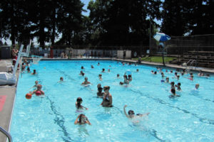 Swimmers enjoy cooling off, in the Camas municipal pool at Crown Park. Since the pool will not be reopened, Camas, Washougal and Port of Camas-Washougal officials hope to combine efforts and build a multi-purpose facility with a pool at another location. The Camas pool will be demolished, and an interactive water feature will be built at that site. (Post-Record file photo)