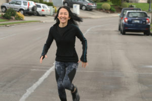 Camas resident Satomi Sano-Abrahamsen trains for the Boston Marathon in her Camas neighborhood in early April. (Wayne Havrelly/Post-Record)