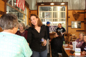 Congressional candidate Carolyn Long, who is vying for Rep. Jaime Herrera Beutler's 3rd Congressional District seat, greets supporters at a fundraiser held May 9 at the 54?40' Brewing Company in Washougal. 