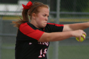 Kennedy Ferguson focuses on her pitch, just a few batters away from her first perfect game. The performance helped the Papermakers beat Union, 13-0, to win the league championship.