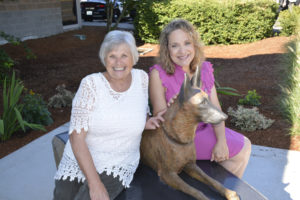 Joyce Lindsay (left), a Washougal Arts and Culture Alliance (WACA) board member, celebrates the 2017 dedication of "Forever Faithful," a life-size bronze sculpture of a Belgian Malinois created by Susan Bahary (right). The artwork is located in front of the Washougal Police station. Lindsay plans to continue serving on the WACA board after she moves to Bellingham. Lindsay recently supported a movement to form a Washougal Arts Commission. (Contributed photo by Rene Carroll)