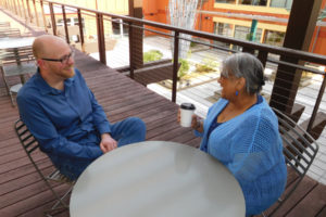 Ron Johnson (left), owner of Grow Camas, meets with Heena Dwivedy (right), president of the Downtown Washougal Association (DWA) in Washougal Town Square. 