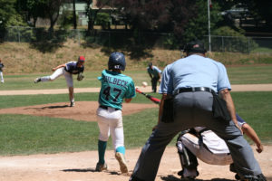 A player from Belgrade, Mont., takes a swing from a pitch from an all-star team from Moses Lake, Wash., on Friday, July 27, at Louis Bloch Park in Camas. 