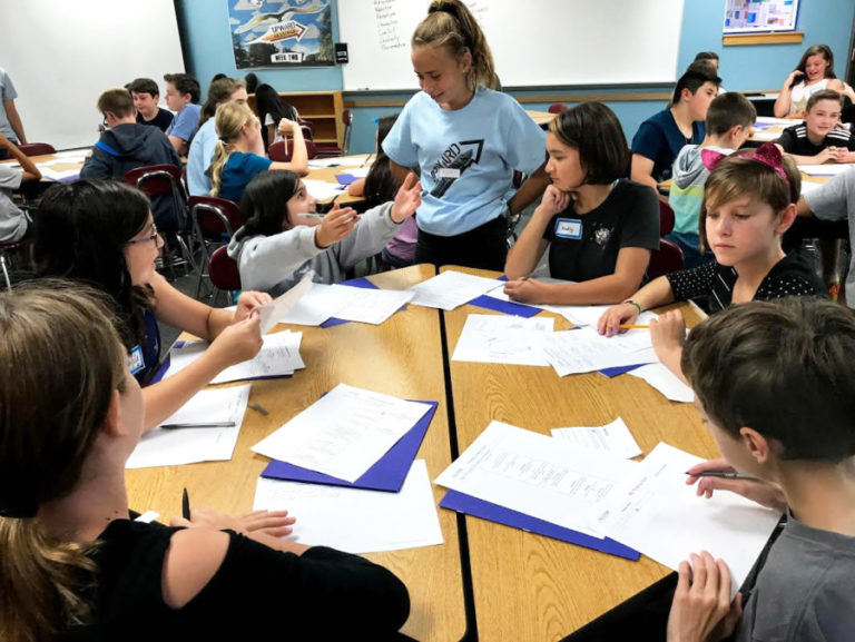 Incoming sixth grade students work with an UPWARD middle school mentor on worksheets that help students develop into the type of person they want to be during the week long summer camp. The camp was created by Heather Fresh, a parent of three Camas students, and expanded to Skyridge Middle School in its second year, after only being held at Liberty Middle school.