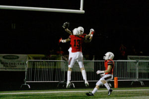 Camas High School football recievers Luc Sturbelle and Jackson Clemmer celebrate a touchdown that tied the game with just over two minutes left on Friday, Sept. 21. 