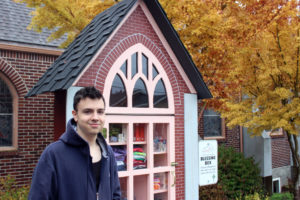 Reece Marciel, 17, a senior at Camas High School, stands outside the Blessing Box at St. John's Presbyterian Church in Camas, on Oct. 26. Marciel's senior project involves organizing the box, filled with donated items such as food, clothing, toiletries and shoes that people in need can access any time of day or night. 