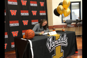 The Panthers' Beyonce Bea officially signs a commitment to play Division 1 women's basketball for the University of Idaho Vandals next year, at a Nov. 16 signing event at Washougal High School. (Contributed photo courtesy of Jada Bea)