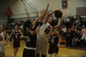 Washougal sophomore Skylar Bea rises up for a shot against the defending state champions from W.F. West at a home game, Nov. 30. 