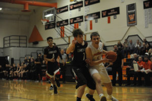 Panther junior Brevan Bea draws a foul in the closing minutes of Washougal's win over the Lumberjacks from R.A. Long.