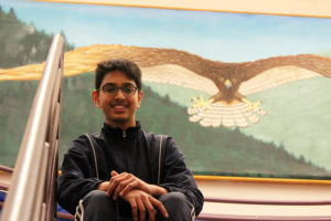 Ishan Mehta, 13, sits near a mural inside Skyridge Middle School in Camas.