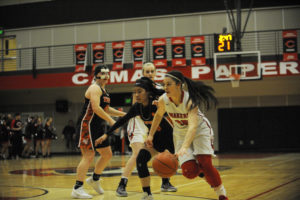 Camas sophomore guard Katelynn Forner drives the lane against a tired Battle Ground defense in a Jan. 30 game that won the Papermakers their 4A league title -- a title Camas shares with Union High. 