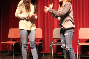 Washougal High seniors Emmy Campen (left) and Audrey Flock (right) pretend to be their "Odd Couple" characters, Florence Ungar and Olive Madison, at the high school on Thursday, Feb. 7. The female version of the play is set for 7 p.m. on Friday, Feb. 15, and Saturday, Feb. 16, as well as 2 p.m. Saturday, Feb. 23. 