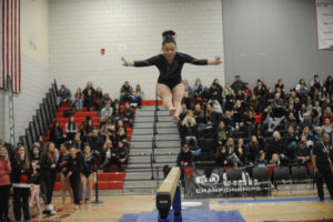 Camas sophomore Alyssa Shibata gives a clutch performance Friday, Feb. 22, on the beam at the state championship meet in Bellevue.