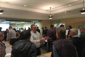 Camas city staff and consultants discuss ideas for roundabouts and traffic signals at a February open house to discuss planned improvements to the Lake Road-Everett Street intersection in Northeast Camas. The open house drew 125 interested community members. The city is planning a second open house in early April. (Contributed photo courtesy of city of Camas)