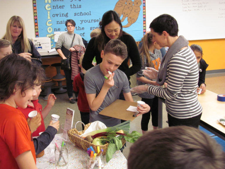 Coleman Multanen eats a vegetable during Washougal School District&#039;s Family Fitness Night, held Feb.