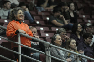 Washougal 1960 alumna Trula Anderson watches the first-round game between Washougal and W.F. West from the stands. She says the rules of basketball were much different when she played the game. 