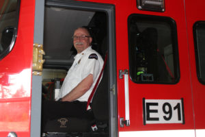 East County Fire and Rescue Fire Chief Mike Carnes sits in an engine at ECFR Fire Station 91 near Grove Field in northern Camas on March 7. Carnes, the district's former deputy fire chief, took over as chief on Feb. 1 after the fire district's board of commissioners voted to end a two-year fire chief sharing program with Camas-Washougal Fire Department. 