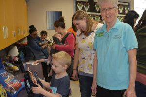 Reed Ebeling (left), Erin Ebeling and Susan Bennett of General Federation of Women's Clubs Camas-Washougal during a recent 1,2,3 Grow and Learn session at Hathaway Elementary School. (Photo submitted by Rene Carroll)