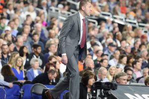 Former Washougal Panther Ronnie Wideman (left) paces the sidelines of college basketball's biggest game. Wideman is the associate athletics director for basketball administration at the University of Virginia. (Photo courtesy of Matt Riley/University of Virginia)