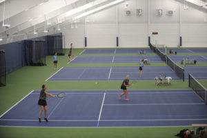 Washougal's state bound doubles team of Beyonce Bea (left) and Paige Wilson (right) during a match at the 2A district tournament. Not only are they doubles partners, they are also both class valedvictorians.