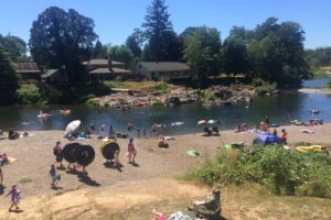 Crowds cool off at the Sandy Swimming Hole in Washougal in July 2017. The National Weather Service has issued an excessive heat warning for the area this week. (Kelly Moyer/Post-Record file photo) 