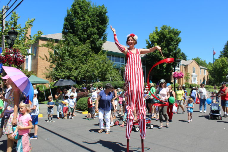 A stilt walker entertains the crowd during the 2019 Camas Days Kids Parade, on Friday, July 26, 2019.