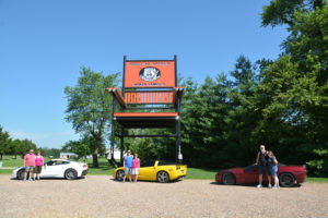 Doug and Julie Norcross of Washougal (left), Arnie Hoag and Linda Wade of Vancouver (middle) and Rick and Bobbi Foster of Vancouver (right) pose for a photo in front of the World's Largest Rocking Chair exhibit in Fanning, Mo., as part of their Route 66 vacation in July. (Contributed photo courtesy of Bobbi Foster)