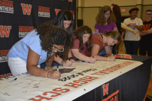 Incoming Washougal High School freshmen sign a "graduation pledge" Aug. 26. (Courtesy of Washougal High School)