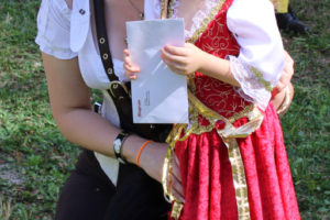 Vancouver resident Arianna Kindsfather (left) and her 3-year-old daughter, Alannah, smile after Alannah was honored in a kids' costume contest at the Pirates in the Park event, held Saturday, Aug. 24 at William Clark Park in Washougal. The event, which was moved to the park from Reflection Plaza, featured performances by Portland band Bilge Rats & Pyrettes and Portland-based Circus Luminescence, children's activities, games, vendors, food, a beer garden, dog agility demonstrations, dance lessons, combat demonstrations and more. To see more photos from the event, visit camaspostrecord.com. (Doug Flanagan/Post-Record)