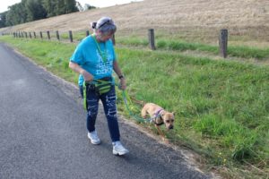 Washougal resident Cindy Cunningham walks along Index Road in Washougal with Brooklyn, an American pit bull terrier, on Sept. 6. Cunningham is a volunteer dog walker for the West Columbia Gorge Humane Society. (Photos by Doug Flanagan/Post-Record)