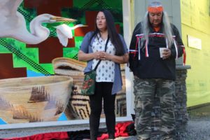 Sophie Garcia (left) of Graham, Wash., speaks during the unveiling ceremony for the "White Wing" mural at Washougal Community Library on Wednesday, Oct. 9. At right is her father Johnnie Lee Wyman, the great-grandson of Washougal founders Richard and Betsey Ough.