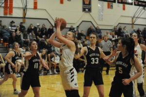 Washougal sophomore Savea Mansfield drives for a basket against Woodland earlier this season. Mansfield has become a key scorer for the Panthers in her second year with the defending state champions. (Wayne Havrelly/Post-Record)