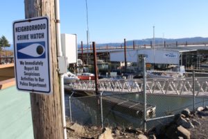 A "neighborhood crime watch" sign hangs on a pole by Parker's Landing Marina in Washougal. Port of Camas-Washougal leaders are considering ways to tighten security after the theft of a yacht in January. 