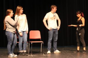 From left to right, Washougal High School drama students Lauren Locke, Savanna Slocum, Nicolas Roseff and Alexis Brock perform during a rehearsal session for the school's upcoming production of 