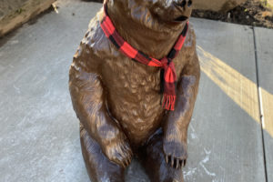 "Dreaming," a bear sculpture in downtown Washougal, wears a scarf to ward off the chilly weather, courtesy of staff from the Big Foot Inn tavern in Washougal. (Contributed photo courtesy of WACA)