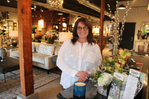 Juxtaposition owner Suzanne Ferguson stands near the front of her new furniture and home decor shop on Friday, Feb. 28. The store is located inside the former Post-Record newspaper building at 425 N.E. Fourth Ave., in downtown Camas. (Photos by Kelly Moyer/Post-Record)