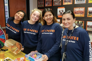 Unite Washougal Community Coalition's Megan Kanzler (far right) participates in an activity with members of Washougal High School's PEP Unite! club. (Contributed photo courtesy of Margaret McCarthy)