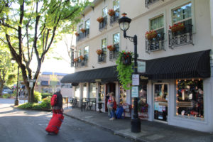 (Post-Record file photo) Guests walk toward the Camas Hotel in downtown Camas in 2019. Police have arrested the hotel's manager in connection with a small fire that broke out Wednesday in an unoccupied guest room.