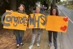 Washougal School District teachers (left to right) Rebecca Bohlin, Chelsea McClement and Mona Davies congratulate Washougal High School seniors during the "Senior Car Parade and Sunset Viewing" event held June 5. (Contributed photo by Rene Carroll, courtesy of Washougal School District)