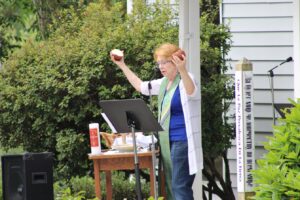 Washougal United Methodist Church pastor Vivian Hiestand conducts a communion ritual during a service on Sunday, July 5. (Doug Flanagan/Post-Record)