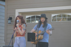 Sarah Vitort (left) and Scott Gilmore, the musicians behind the Portland modern-folk duo Fox and Bones, perform at Vitort's parents' home in Camas on April 8. (Kelly Moyer/Post-Record files)