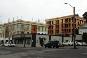 The Clara Flats mixed-use development at Northeast Birch Street and Northeast Sixth Avenue in downtown Camas, shown during its construction in February 2020, received a city tax abatement in exchange for offering six affordable apartments. (Kelly Moyer/Post-Record)