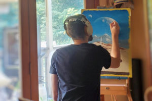 Cody Robertson works on a painting at his Washougal home. (Contributed photo courtesy of Jon Cody Robertson)