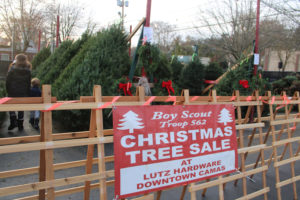 A sign greets visitors at the Boy Scout Troop 562 Christmas Tree Sale, located in the parking lot of Lutz Hardware in downtown Camas, on Nov. 27, 2020. The tree lot, which opened the day after Thanksgiving, on Nov. 27, and is selling Doug and Noble fir trees, will remain open while supplies last, through Sunday, Dec. 13. (Photos by Kelly Moyer/Post-Record)