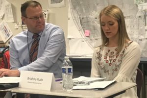 Washougal High School student Briahna Ruth (right) delivers a report to the Washougal School District board of directors during an October 2019 meeting at Canyon Creek Middle School. Washougal High School principal Sheree Clark is planning to relaunch the school's student representative program for the 2021-22 school year. (Post-Record file photo)