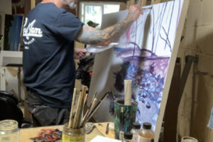 Camas resident Spike Palmer paints on a canvas at his home studio. Palmer's artwork will be available at the 2021 Washougal Art Festival, to be held Saturday, Aug. 14, at Reflection Plaza in Washougal. (Contributed photo courtesy of Spike Palmer)