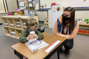 Gause Elementary Teacher Brittni Nester helps student Madisyn Beaver with a project during a class session in November 2020. (Photo courtesy of Washougal School District)